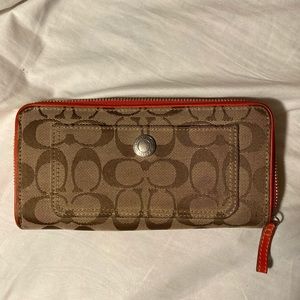 Coach brown cloth monogrammed red leather wallet